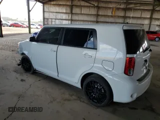 2012 Scion xB with VIN JTLZE4FE2CJ028761, listed as a Copart auction lot 53379165 with 131,758 mi miles and Salvage Title. Bid and sale history available at DreamBid. Image 2.