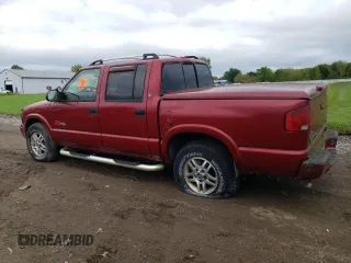 2002 GMC Sonoma SLS with VIN 1GTDT13W62K203061, listed as a Copart auction lot 83095774 with 136,118 mi miles and Salvage Title. Bid and sale history available at carsss.com. Image 2.