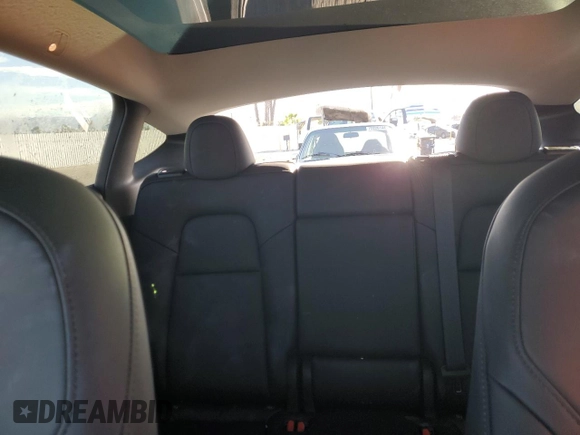 2024 Tesla Model Y Long Range с VIN 7SAYGDEE3RA236473, выставлен на аукционе Copart как лот 77409334 с пробегом 5 822 миль миль и Списание • Salvage title. История ставок и продаж доступна на DreamBid. Изображение 10.