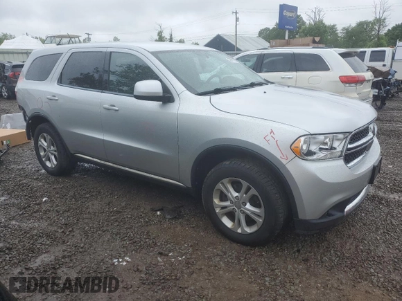 2012 Dodge Durango SXT with VIN 1C4RDJAG4CC106273, listed as a Copart auction lot 59767205 with 223,098 mi miles and Salvage title. Bid and sale history available at DreamBid. Image 4.