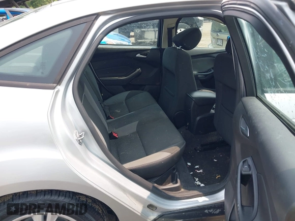 2013 Ford Focus SE with VIN 1FADP3F28DL208516, listed as a IAAI auction lot 42399006 with 103,869 mi miles and . Bid and sale history available at DreamBid. Image 8.
