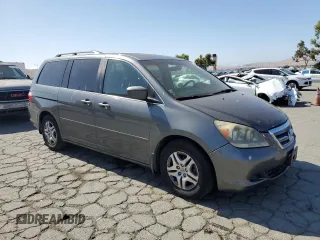 2007 Honda Odyssey EX-L z VIN 5FNRL38677B424117, wystawiony jako Copart lot #58814235 z przebiegiem 188 908 mil mil oraz Szkoda całkowita • Salvage title. Historia ofert i sprzedaży dostępna na DreamBid. Obrazek 4.