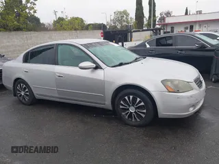 2005 Nissan Altima 2.5 S with VIN 1N4AL11D25N413377, listed as a IAAI auction lot 41919546 with 235,704 mi miles. Bid and sale history available at carsss.com. Image 14.