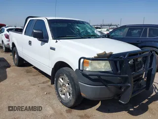 2007 Ford F-150 STX with VIN 1FTRX14W97KD36834, listed as a IAAI auction lot 42548806 with 207,391 mi miles and . Bid and sale history available at DreamBid. Image 1.