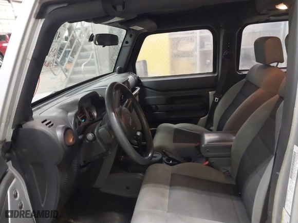 2010 Jeep Wrangler Unlimited Sport with VIN 1J4BA3H10AL112599, listed as a IAAI auction lot 41739263 with 156,301 mi miles. Bid and sale history available at carsss.com. Image 5.