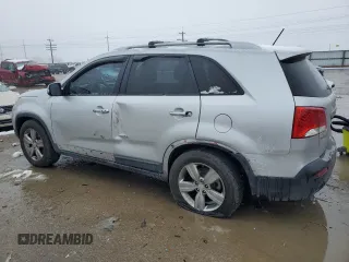 2013 Kia Sorento EX с VIN 5XYKU4A61DG351443, выставлен на аукционе Copart как лот 86988774 с пробегом 196 542 миль миль и Списание • Salvage title. История ставок и продаж доступна на DreamBid. Изображение 2.