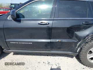 2014 Jeep Grand Cherokee Laredo with VIN 1C4RJEAG0EC442053, listed as a IAAI auction lot 42098601 with 200,982 mi miles and . Bid and sale history available at DreamBid. Image 14.