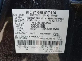 2013 Ford Edge SEL with VIN 2FMDK4JC7DBE00441, listed as a IAAI auction lot 41661591 with 131,411 mi miles. Bid and sale history available at carsss.com. Image 9.