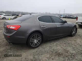 2016 Maserati Ghibli z VIN ZAM57XSA7G1168458, wystawiony jako Copart lot #43611465 z przebiegiem 98 110 mil mil oraz Szkody całkowita. Historia ofert i sprzedaży dostępna na DreamBid. Obrazek 3.