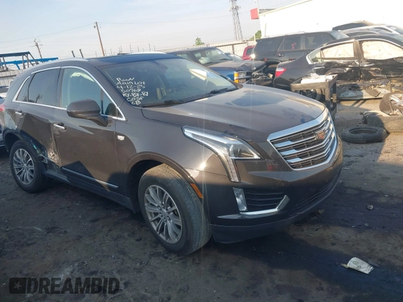 2019 Cadillac XT5 Luxury FWD z VIN 1GYKNCRS2KZ251207, wystawiony jako IAAI lot #42066271 z przebiegiem 128 226 mil mil oraz . Historia ofert i sprzedaży dostępna na DreamBid. Obrazek 1.