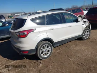 2017 Ford Escape SE z VIN 1FMCU9GD6HUB41900, wystawiony jako IAAI lot #41689153 z przebiegiem 85 975 mil mil oraz . Historia ofert i sprzedaży dostępna na DreamBid. Obrazek 4.