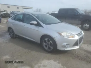 2014 Ford Focus SE with VIN 1FADP3F24EL264003, listed as a Copart auction lot 43800485 with 138,390 mi miles and Salvage Title. Bid and sale history available at DreamBid. Image 4.