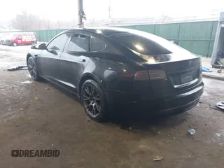 2022 Tesla Model S Plaid with VIN 5YJSA1E64NF477855, listed as a IAAI auction lot 41470591 with Not provided miles and . Bid and sale history available at DreamBid. Image 3.