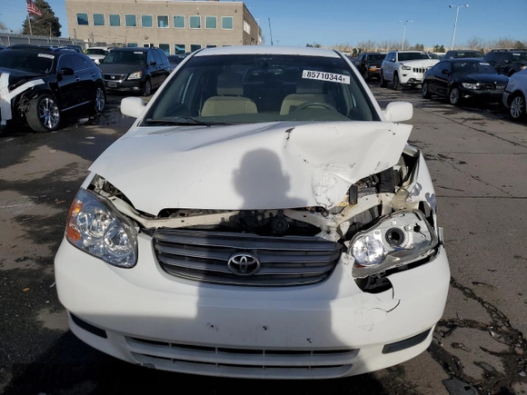 2003 Toyota Corolla CE with VIN 1NXBR32EX3Z057713, listed as a Copart auction lot 85710344 with 188,478 mi miles and Salvage Title. Bid and sale history available at DreamBid. Image 5.