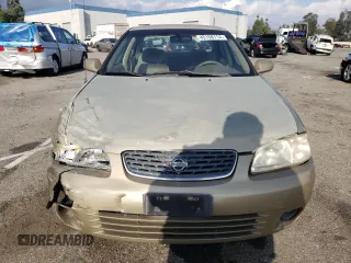 2000 Nissan Sentra XE with VIN 3N1CB51D3YL311011, listed as a Copart auction lot 71841274 with 146,760 mi miles and Salvage title. Bid and sale history available at DreamBid. Image 5.