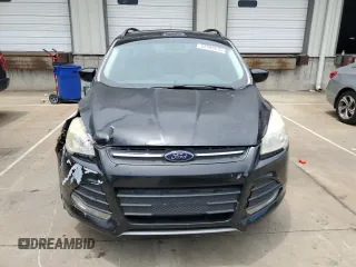 2014 Ford Escape SE с VIN 1FMCU9G9XEUD53223, выставлен на аукционе Copart как лот 62909615 с пробегом 179 579 миль миль и Списание • Salvage title. История ставок и продаж доступна на DreamBid. Изображение 5.