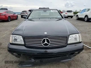 1999 Mercedes-Benz SL 500 z VIN WDBFA68F4XF185727, wystawiony jako Copart lot #58572645 z przebiegiem 107 881 mil mil oraz Szkody całkowita. Historia ofert i sprzedaży dostępna na DreamBid. Obrazek 5.