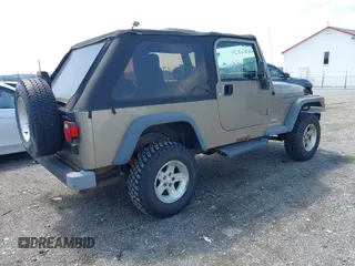 2004 Jeep Wrangler Sport with VIN 1J4FA49SX4P774167, listed as a IAAI auction lot 42686834 with 170,731 mi miles and . Bid and sale history available at DreamBid. Image 4.