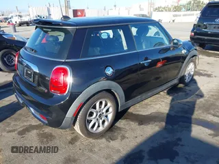 2014 MINI Hardtop S z VIN WMWXM7C59ET970371, wystawiony jako IAAI lot #41643992 z przebiegiem 123 813 mil mil oraz . Historia ofert i sprzedaży dostępna na DreamBid. Obrazek 4.