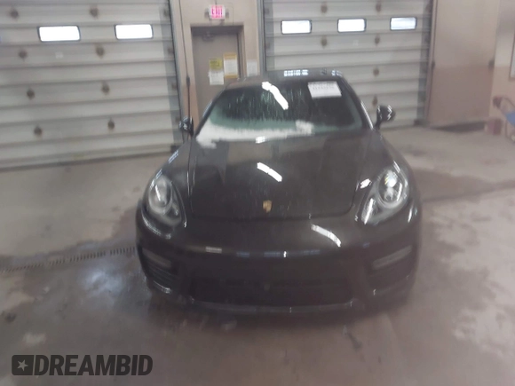 2014 Porsche Panamera GTS with VIN WP0AF2A73EL083133, listed as a IAAI auction lot 41945656 with 75,701 mi miles and . Bid and sale history available at DreamBid. Image 12.