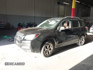 2017 Subaru Forester Touring z VIN JF2SJAWC8HH470269, wystawiony jako IAAI lot #41950347 z przebiegiem 135 189 mil mil oraz . Historia ofert i sprzedaży dostępna na DreamBid. Obrazek 2.