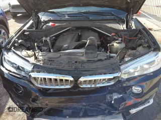 2016 BMW X5 xDrive35i with VIN 5UXKR0C54G0U11822, listed as a IAAI auction lot 41909821 with 149,460 mi miles. Bid and sale history available at carsss.com. Image 10.