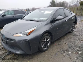 2019 Toyota Prius L Eco with VIN JTDKARFU8K3085918, listed as a IAAI auction lot 41107891 with 166,295 mi miles. Bid and sale history available at carsss.com. Image 2.