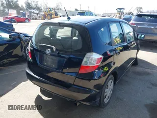 2010 Honda Fit with VIN JHMGE8H28AS012129, listed as a IAAI auction lot 41980485 with 144,170 mi miles. Bid and sale history available at carsss.com. Image 4.