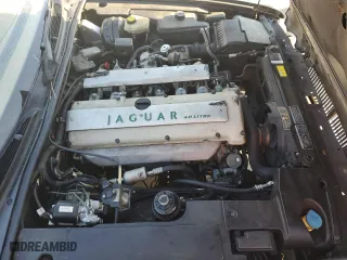 1997 Jaguar XJ with VIN SAJHX1245VC805665, listed as a Copart auction lot 45024125 with 0 mi miles and Salvage Title. Bid and sale history available at carsss.com. Image 11.