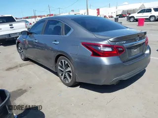 2018 Nissan Altima SR with VIN 1N4AL3AP6JC120402, listed as a IAAI auction lot 41949433 with 58,595 mi miles and . Bid and sale history available at carsss.com. Image 3.