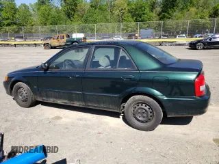 1999 Mazda Protege DX with VIN JM1BJ2223X0139775, listed as a Copart auction lot 54338455 with 63,198 mi miles and Salvage Title. Bid and sale history available at DreamBid. Image 2.