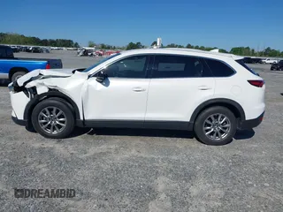 2019 Mazda CX-9 Touring z VIN JM3TCACY3K0333931, wystawiony jako IAAI lot #41968519 z przebiegiem 102 992 mil mil oraz . Historia ofert i sprzedaży dostępna na DreamBid. Obrazek 14.