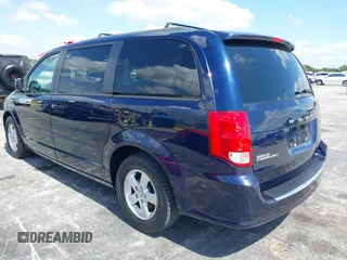 2013 Dodge Grand Caravan SXT with VIN 2C4RDGCG3DR611519, listed as a IAAI auction lot 42237571 with 156,858 mi miles and . Bid and sale history available at DreamBid. Image 3.