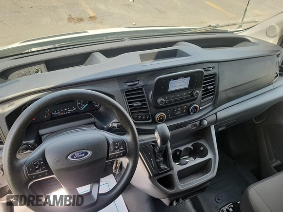2023 Ford Transit Cargo with VIN 1FTBR1X87PKC01635, listed as a IAAI auction lot 42832727 with 17,348 mi miles and . Bid and sale history available at DreamBid. Image 15.