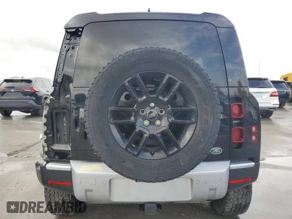 2023 Land Rover Defender SE with VIN SALEP7EU1P2186080, listed as a Copart auction lot 84107764 with 9,780 mi miles and Salvage title. Bid and sale history available at DreamBid. Image 6.