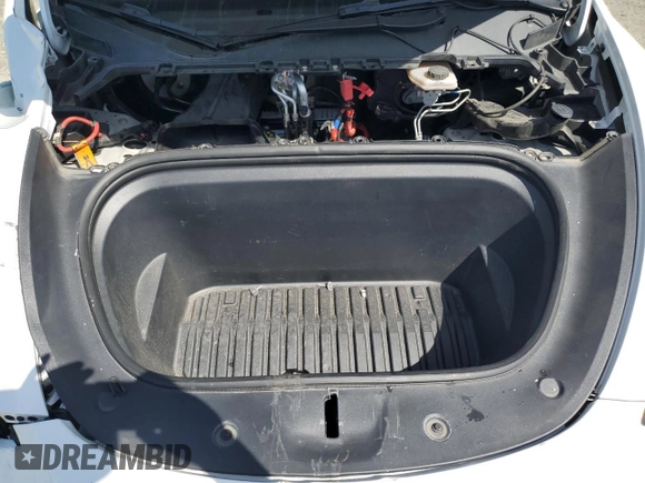 2022 Tesla Model Y Long Range z VIN 7SAYGAEE6NF492070, wystawiony jako Copart lot #52032415 z przebiegiem 143 732 mil mil oraz Szkody całkowita. Historia ofert i sprzedaży dostępna na DreamBid. Obrazek 12.