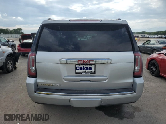 2020 GMC Yukon XL Denali with VIN 1GKS2HKJ4LR201038, listed as a Copart auction lot 66917904 with 99,944 mi miles and Salvage Title. Bid and sale history available at carsss.com. Image 6.