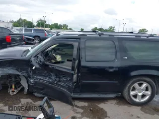 2007 Chevrolet Suburban LT with VIN 1GNFC16097R179358, listed as a IAAI auction lot 42104937 with Not provided miles and . Bid and sale history available at DreamBid. Image 14.