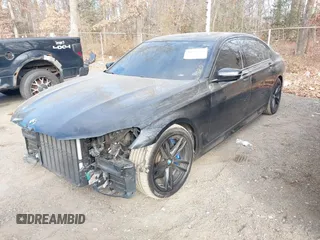 2019 BMW 7 Series 750i xDrive with VIN WBA7F2C52KB240302, listed as a IAAI auction lot 40984933 with 93,737 mi miles and . Bid and sale history available at DreamBid. Image 17.