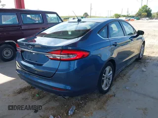 2018 Ford Fusion SE z VIN 3FA6P0HD8JR201052, wystawiony jako IAAI lot #42367050 z przebiegiem 90 502 mil mil oraz . Historia ofert i sprzedaży dostępna na DreamBid. Obrazek 4.