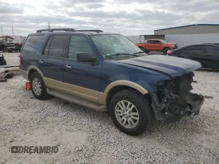 2011 Ford Expedition XLT with VIN 1FMJU1H52BEF47545, listed as a Copart auction lot 52987825 with 127,500 mi miles and Salvage title. Bid and sale history available at DreamBid. Image 4.