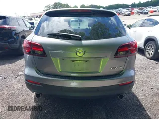 2014 Mazda CX-9 Grand Touring с VIN JM3TB2DA3E0443604, выставлен на аукционе IAAI как лот 42456552 с пробегом 150 053 миль миль и . История ставок и продаж доступна на DreamBid. Изображение 16.