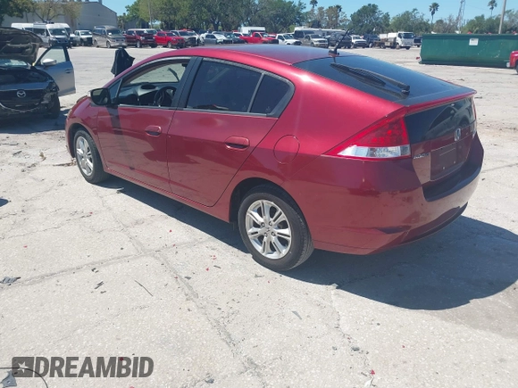 2010 Honda Insight EX with VIN JHMZE2H71AS021062, listed as a IAAI auction lot 41857350 with 45,558 mi miles and . Bid and sale history available at carsss.com. Image 3.