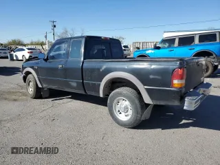 1997 Ford Ranger XLT with VIN 1FTCR15X2VPA50685, listed as a Copart auction lot 81790574 with 128,458 mi miles and Salvage Title. Bid and sale history available at DreamBid. Image 2.