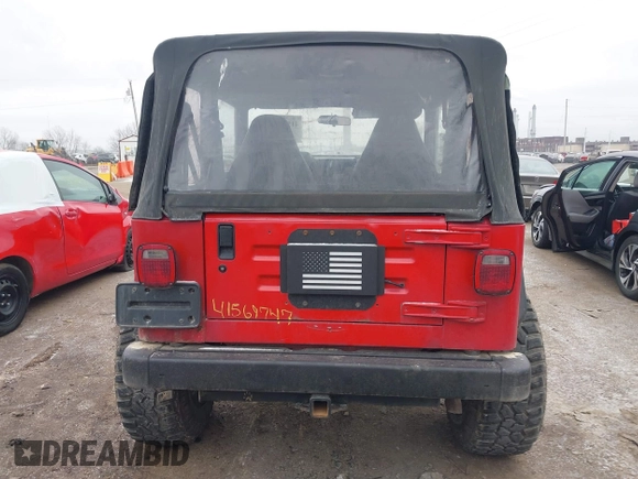 2002 Jeep Wrangler X z VIN 1J4FA39S52P708519, wystawiony jako IAAI lot #41569747 z przebiegiem 219 168 mil mil oraz . Historia ofert i sprzedaży dostępna na DreamBid. Obrazek 16.