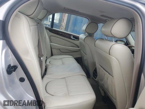 2004 Jaguar XJ with VIN SAJEA74C64SG08121, listed as a Copart auction lot 81736984 with 100,144 mi miles and Non Repairable. Bid and sale history available at DreamBid. Image 10.
