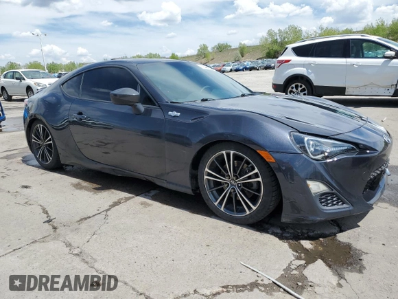 2015 Scion FR-S z VIN JF1ZNAA12F8707784, wystawiony jako Copart lot #56248735 z przebiegiem 119 679 mil mil oraz Szkoda całkowita • Salvage title. Historia ofert i sprzedaży dostępna na DreamBid. Obrazek 4.