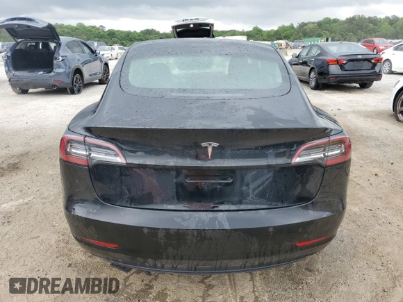2022 Tesla Model 3 with VIN 5YJ3E1EA0NF372095, listed as a Copart auction lot 54958215 with 148,441 mi miles and Clean Title. Bid and sale history available at DreamBid. Image 6.