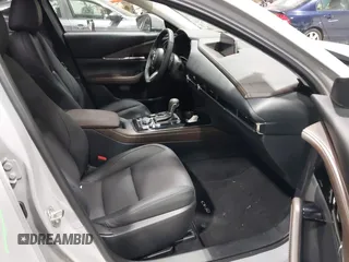 2025 Mazda CX-30 S Premium with VIN 3MVDMBDM5SM788786, listed as a IAAI auction lot 42126428 with 1,370 mi miles and . Bid and sale history available at DreamBid. Image 5.