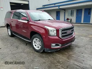 2019 GMC Yukon XL SLT Standard Edition with VIN 1GKS2JKC0KR128371, listed as a Copart auction lot 72687234 with 75,570 mi miles and Salvage Title. Bid and sale history available at carsss.com. Image 12.